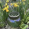 Bohemian Art Nouveau green iridescent glass vase with brass grille