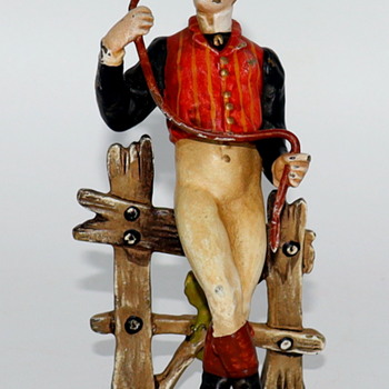19th Century Cold Painted Bronze Jockey Leaning Against A Fence