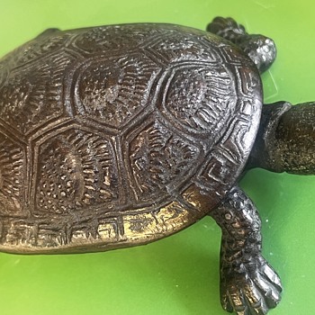 A tortoise match holder with fine detail possibly brass  - Animals