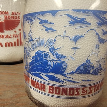 EAST SIDE DAIRY...LORAIN OHIO WAR SLOGAN MILK BOTTLE  - Bottles