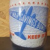 CLOVERLAND FARMS DAIRY WAR SLOGAN MILK BOTTLE