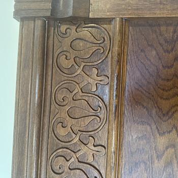 Oak headboard. I am trying to find out the meaning of the carved symbols - Furniture
