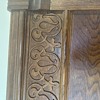 Oak headboard. I am trying to find out the meaning of the carved symbols