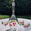 A 'Early Loetz Intarsia' Carafe with three Wine Glasses.