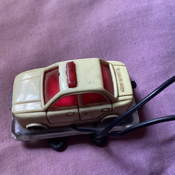 very old plastic car flashing light.