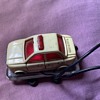 very old plastic car flashing light.
