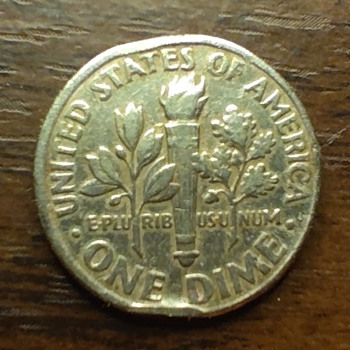 2000 dime with similar marking to one of your 1990 dimes.  Coincidence or rare?  - US Coins