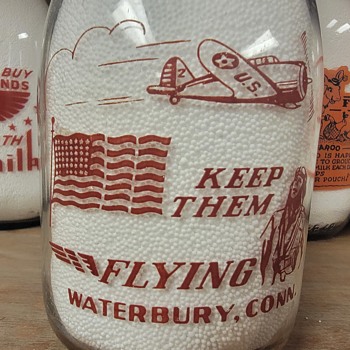 MANUEL'S MILK...WATERBURY CONNECTICUT...WAR SLOGAN MILK  BOTTLE - Bottles