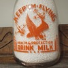 LENICK'S DAIRY...LAPORTE INDIANA WAR SLOGAN MILK BOTTLE