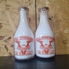PRODUCERS DAIRY..DANVILLE ILLINOIS WAR SLOGAN MILK BOTTLES