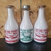 PURSUIT PLANE & MEDIUM BOMBER WAR SLOGAN MILK BOTTLES 