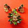Verified D & E multi color rhinestone brooch set