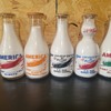 MORE WAR SLOGAN AIRPLANE MILK BOTTLES 