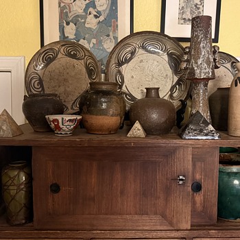 Horse Eye Plates and Storage Jars on top of a tansu in my kitchen - Asian