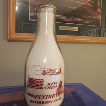 MANUEL'S MILK...WATERBURY CONNECTICUT...WAR SLOGAN MILK  BOTTLE - Bottles