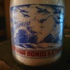 EAST SIDE DAIRY...LORAIN OHIO WAR SLOGAN MILK BOTTLE 