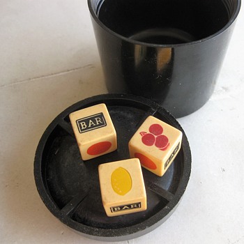 Bakelite dice and gaming pieces in WW2 bakelite fuse container - Games