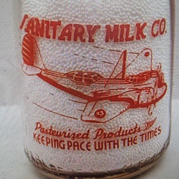 Sanitary Dairy..Rantoul Illinois Quart War Airplane Bottle.... - Bottles