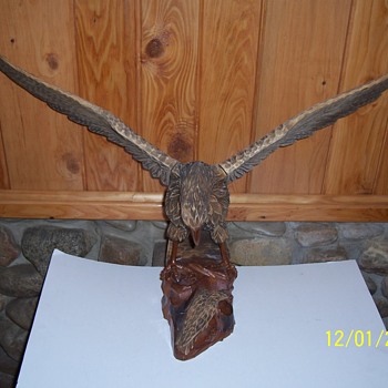 hand carved eagle with baby and snake - Fine Art