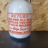 SUNSET DAIRY..TUSCON ARIZONA WAR SLOGAN MILK BOTTLE